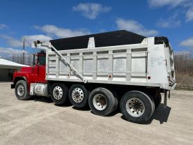 1999 MACK RB6885 DUMP DUMP TRUCK 400E7 QUAD AXLE at T&T Repairables - used car dealership in Spencer, Indiana.