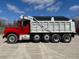 1999 MACK RB6885 DUMP DUMP TRUCK 400E7 QUAD AXLE at T&T Repairables - used car dealership in Spencer, Indiana.
