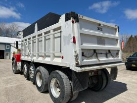 1999 MACK RB6885 DUMP DUMP TRUCK 400E7 QUAD AXLE at T&T Repairables - used car dealership in Spencer, Indiana.