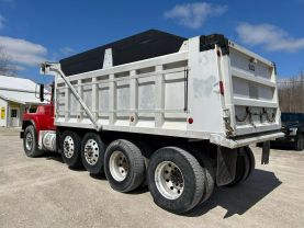 1999 MACK RB6885 DUMP DUMP TRUCK 400E7 QUAD AXLE at T&T Repairables - used car dealership in Spencer, Indiana.