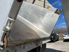 1999 MACK RB6885 DUMP DUMP TRUCK 400E7 QUAD AXLE at T&T Repairables - used car dealership in Spencer, Indiana.