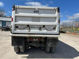 1999 MACK RB6885 DUMP DUMP TRUCK 400E7 QUAD AXLE at T&T Repairables - used car dealership in Spencer, Indiana.