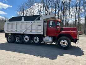 1999 MACK RB6885 DUMP DUMP TRUCK 400E7 QUAD AXLE at T&T Repairables - used car dealership in Spencer, Indiana.
