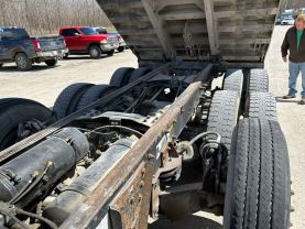 1999 MACK RB6885 DUMP DUMP TRUCK 400E7 QUAD AXLE at T&T Repairables - used car dealership in Spencer, Indiana.