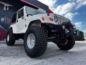 2000 JEEP WRANGLER SUV 6-CYL, 4.0 LITER SAHARA SPORT UTILITY 2D