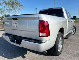 Buy Quality Used 2018 RAM 1500 QUAD CAB PICKUP SILVER AUTOMATIC - Concept Car Auto Sales near Orlando, FL