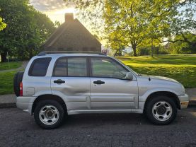 2002 SUZUKI GRAND VITARA SUV V6, 2.5 LITER JLX HARD TOP SPORT UTILITY 4D