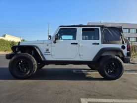 2012 JEEP WRANGLER SUV V6, 3.6 LITER UNLIMITED SPORT SUV 4D
