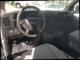 2014 CHEVROLET EXPRESS 1500 PASSENGER VAN V8, FLEX FUEL, 5.3 LITER LS VAN 3D at Motors On Wheels - used car dealership in Houston, Texas.