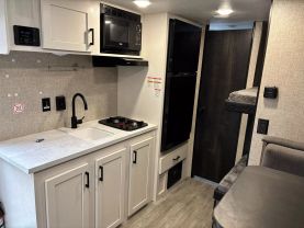 2024 JAYCO JAY FLIGHT RV - SLX at T&T Repairables - used car dealership in Spencer, Indiana.