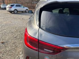 2021 INFINITI QX50 SUV 4-CYL, TURBO, 2.0 LITER LUXE SPORT UTILITY 4D at T&T Repairables - used car dealership in Spencer, Indiana.