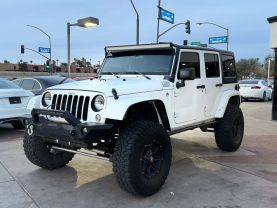 2016 JEEP WRANGLER SUV V6, 3.6 LITER UNLIMITED SAHARA SPORT UTILITY 4D