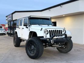 2016 JEEP WRANGLER SUV V6, 3.6 LITER UNLIMITED SAHARA SPORT UTILITY 4D
