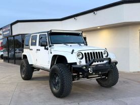 2016 JEEP WRANGLER SUV V6, 3.6 LITER UNLIMITED SAHARA SPORT UTILITY 4D