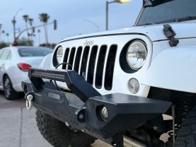 2016 JEEP WRANGLER SUV V6, 3.6 LITER UNLIMITED SAHARA SPORT UTILITY 4D