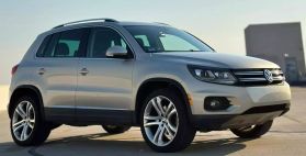 2012 VOLKSWAGEN TIGUAN SUV 4-CYL, TURBO, 2.0 LITER 2.0T SEL SPORT UTILITY 4D