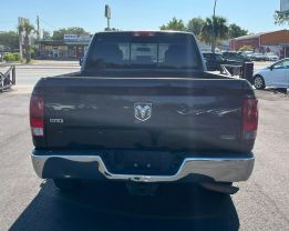 2011 RAM 1500 QUAD CAB PICKUP BLACK AUTOMATIC -  V & B Auto Sales