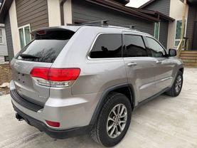 2014 JEEP GRAND CHEROKEE SUV V6, FLEX FUEL, 3.6 LITER LAREDO E SPORT UTILITY 4D