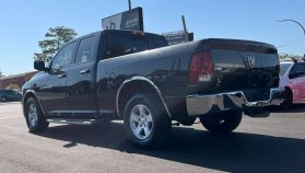 2011 RAM 1500 QUAD CAB PICKUP BLACK AUTOMATIC -  V & B Auto Sales