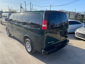 2014 CHEVROLET EXPRESS 1500 PASSENGER PASSENGER V8, FLEX FUEL, 5.3 LITER LS VAN 3D at Motors On Wheels - used car dealership in Houston, Texas.