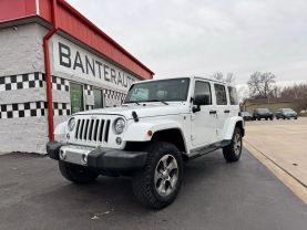 2017 JEEP WRANGLER UNLIMITED SUV V6, 3.6 LITER SAHARA SPORT UTILITY 4D