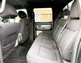 2014 FORD F150 SUPERCREW CAB PICKUP TUXEDO BLACK METALLIC AUTOMATIC - Capital City Auto