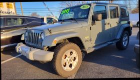2015 Jeep Wrangler Unlimited Sahara Sport Utility 4d - Image 1