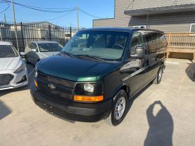 2014 CHEVROLET EXPRESS 1500 PASSENGER PASSENGER V8, FLEX FUEL, 5.3 LITER LS VAN 3D at Motors On Wheels - used car dealership in Houston, Texas.
