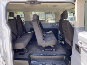 2019 FORD TRANSIT 150 WAGON PASSENGER V6, 3.7 LITER XLT W/LOW ROOF W/60/40 SIDE DOOR VAN 3D at Motors On Wheels - used car dealership in Houston, Texas.