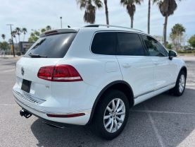 2015 VOLKSWAGEN TOUAREG SUV V6, 3.6 LITER V6 LUX SPORT UTILITY 4D
