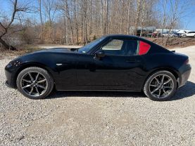 2021 MAZDA MX-5 MIATA RF CONVERTIBLE 4-CYL, SKYACTIV-G, 2.0 LITER GRAND TOURING CONVERTIBLE 2D at T&T Repairables - used car dealership in Spencer, Indiana.