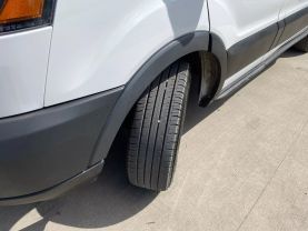 2019 FORD TRANSIT 150 WAGON PASSENGER V6, 3.7 LITER XLT W/LOW ROOF W/60/40 SIDE DOOR VAN 3D at Motors On Wheels - used car dealership in Houston, Texas.