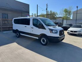 2019 FORD TRANSIT 150 WAGON PASSENGER V6, 3.7 LITER XLT W/LOW ROOF W/60/40 SIDE DOOR VAN 3D at Motors On Wheels - used car dealership in Houston, Texas.