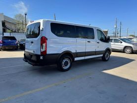 2019 FORD TRANSIT 150 WAGON PASSENGER V6, 3.7 LITER XLT W/LOW ROOF W/60/40 SIDE DOOR VAN 3D at Motors On Wheels - used car dealership in Houston, Texas.