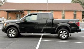 2014 FORD F150 SUPERCREW CAB PICKUP TUXEDO BLACK METALLIC AUTOMATIC - Capital City Auto