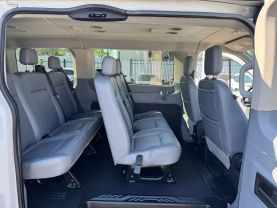 2019 FORD TRANSIT 150 WAGON PASSENGER V6, 3.7 LITER XLT W/LOW ROOF W/60/40 SIDE DOOR VAN 3D at Motors On Wheels - used car dealership in Houston, Texas.