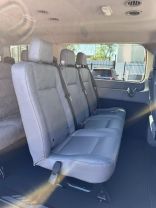 2019 FORD TRANSIT 150 WAGON PASSENGER V6, 3.7 LITER XLT W/LOW ROOF W/60/40 SIDE DOOR VAN 3D at Motors On Wheels - used car dealership in Houston, Texas.