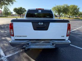 2010 NISSAN FRONTIER CREW CAB PICKUP V6, 4.0 LITER LE PICKUP 4D 5 FT