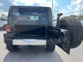 2015 JEEP WRANGLER SUV V6, 3.6 LITER UNLIMITED SAHARA SPORT UTILITY 4D