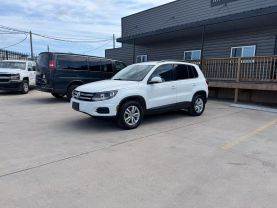 2016 VOLKSWAGEN TIGUAN SUV 4-CYL, TURBO, 2.0 LITER 2.0T S SPORT UTILITY 4D at Motors On Wheels - used car dealership in Houston, Texas.