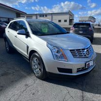 2015 CADILLAC SRX SUV V6, 3.6 LITER LUXURY COLLECTION SPORT UTILITY 4D