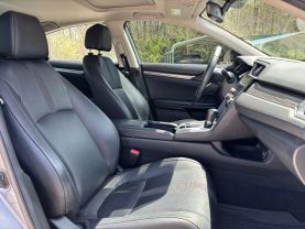 2019 HONDA CIVIC SEDAN 4-CYL, PZEV, TURBO, 1.5 LITER EX-L SEDAN 4D at T&T Repairables - used car dealership in Spencer, Indiana.