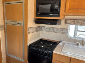 2006 GULF STREAM 24BHL RV - CONQUEST LITE at T&T Repairables - used car dealership in Spencer, Indiana.