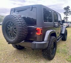 2018 JEEP WRANGLER UNLIMITED SUV V6, 3.6 LITER SAHARA (JK) SPORT UTILITY 4D