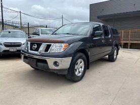 2010 NISSAN FRONTIER PICKUP V6 4.0L GASOLINE CREW CAB LE 4WD 4.0L V6 at Motors On Wheels - used car dealership in Houston, Texas.