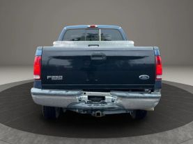 2005 FORD F250 SUPER DUTY SUPER CAB PICKUP V8, TURBO DSL 6.0L LARIAT PICKUP 4D 6 3/4 FT