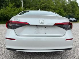 2024 HONDA CIVIC SEDAN 4-CYL, I-VTEC, 2.0 LITER LX SEDAN 4D at T&T Repairables - used car dealership in Spencer, Indiana.