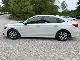 2024 HONDA CIVIC SEDAN 4-CYL, I-VTEC, 2.0 LITER LX SEDAN 4D at T&T Repairables - used car dealership in Spencer, Indiana.