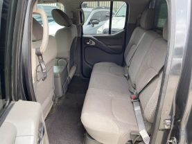 2010 NISSAN FRONTIER PICKUP V6 4.0L GASOLINE CREW CAB LE 4WD 4.0L V6 at Motors On Wheels - used car dealership in Houston, Texas.