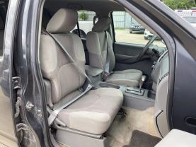 2010 NISSAN FRONTIER PICKUP V6 4.0L GASOLINE CREW CAB LE 4WD 4.0L V6 at Motors On Wheels - used car dealership in Houston, Texas.